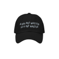 Wasted Days Hat featuring bold embroidery with the phrase “A DAY NOT WASTED IS A DAY WASTED” on a black cap, embodying a 