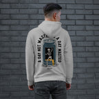 Young man models the Wasted Days Hoodie & Sweatshirt, featuring a skeleton escaping a soda can with the phrases “A DAY NOT WASTED” and “A DAY WASTED” on the back.