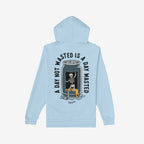 Wasted Days Hoodie & Sweatshirt features a skeleton emerging from a beer can, symbolizing rebellious freedom with the slogan A Day Not Wasted Is A Day Wasted, embodying bold, carefree living.