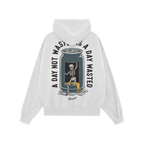 Wasted Days Hoodie & Sweatshirt features a skeleton lounging in a beer can, spilling golden liquid, with the slogan “A DAY 