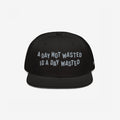 The Wasted Days Hat features bold white embroidery stating, A Day Not Wasted Is A Day Wasted, on a black snapback, embodying a carefree, unapologetic lifestyle ideal for vibrant, inclusive gatherings.