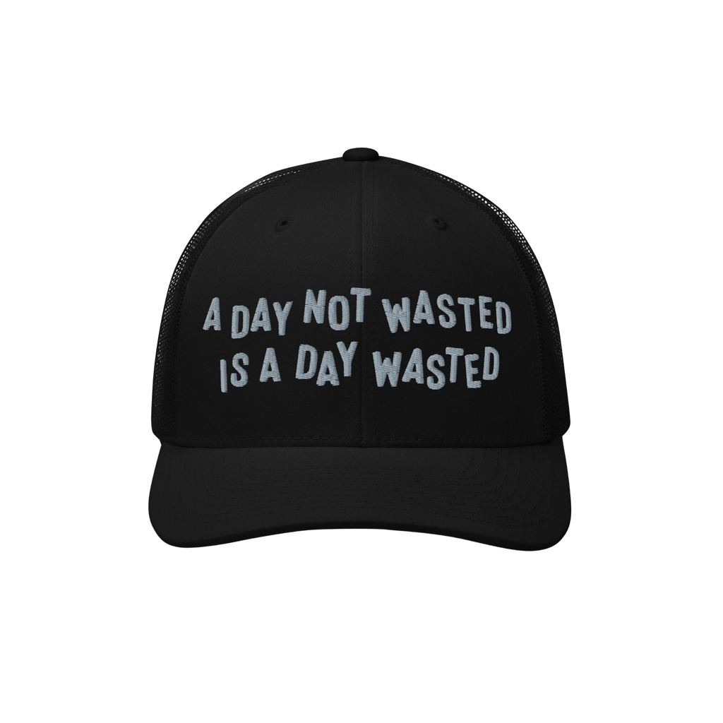 Wasted Days Hat featuring the phrase A Day Not Wasted Is A Day Wasted embroidered in a playful font on a black mesh-back truc
