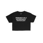 Watch List Women's Baby Tee with bold white text PROBABLY ON A GOVERNMENT WATCH LIST on a black background. Retro, fitted cro