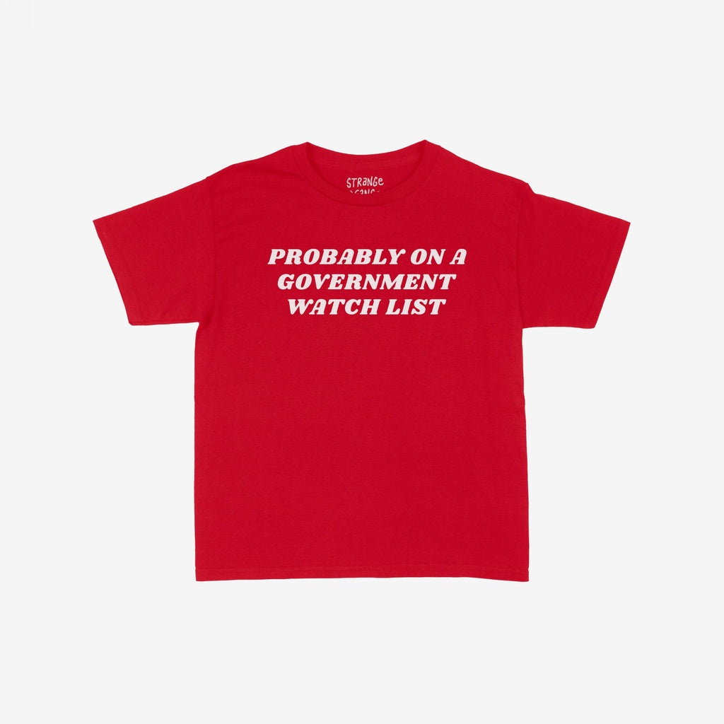 Watch List Women's Baby Tee features bold white text on a red, short-sleeve design, reflecting a rebellious, feminist stance. Perfect for activists challenging authority with a sleek, Y2K-style fit.
