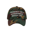 Watch List Hat: Six-panel baseball cap in woodland camo with “PROBABLY ON A GOVERNMENT WATCH LIST” stitched in white, fea