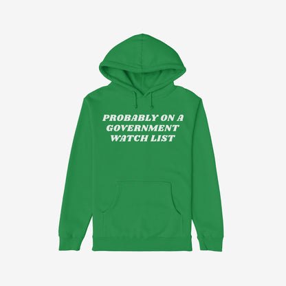 Green Watch List Hoodie with bold white text, PROBABLY ON A GOVERNMENT WATCH LIST, across the chest, featuring a kangaroo pocket. Ideal for those speaking against authoritarianism.