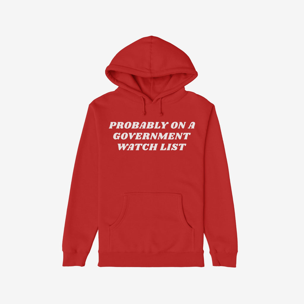Watch List Hoodie & Sweatshirt featuring bold white text PROBABLY ON A GOVERNMENT WATCH LIST on a red pullover with a front kangaroo pocket, symbolizing defiance and activism against authoritarianism.