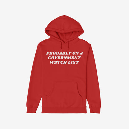 Watch List Hoodie & Sweatshirt featuring bold white text PROBABLY ON A GOVERNMENT WATCH LIST on a red pullover with a front kangaroo pocket, symbolizing defiance and activism against authoritarianism.