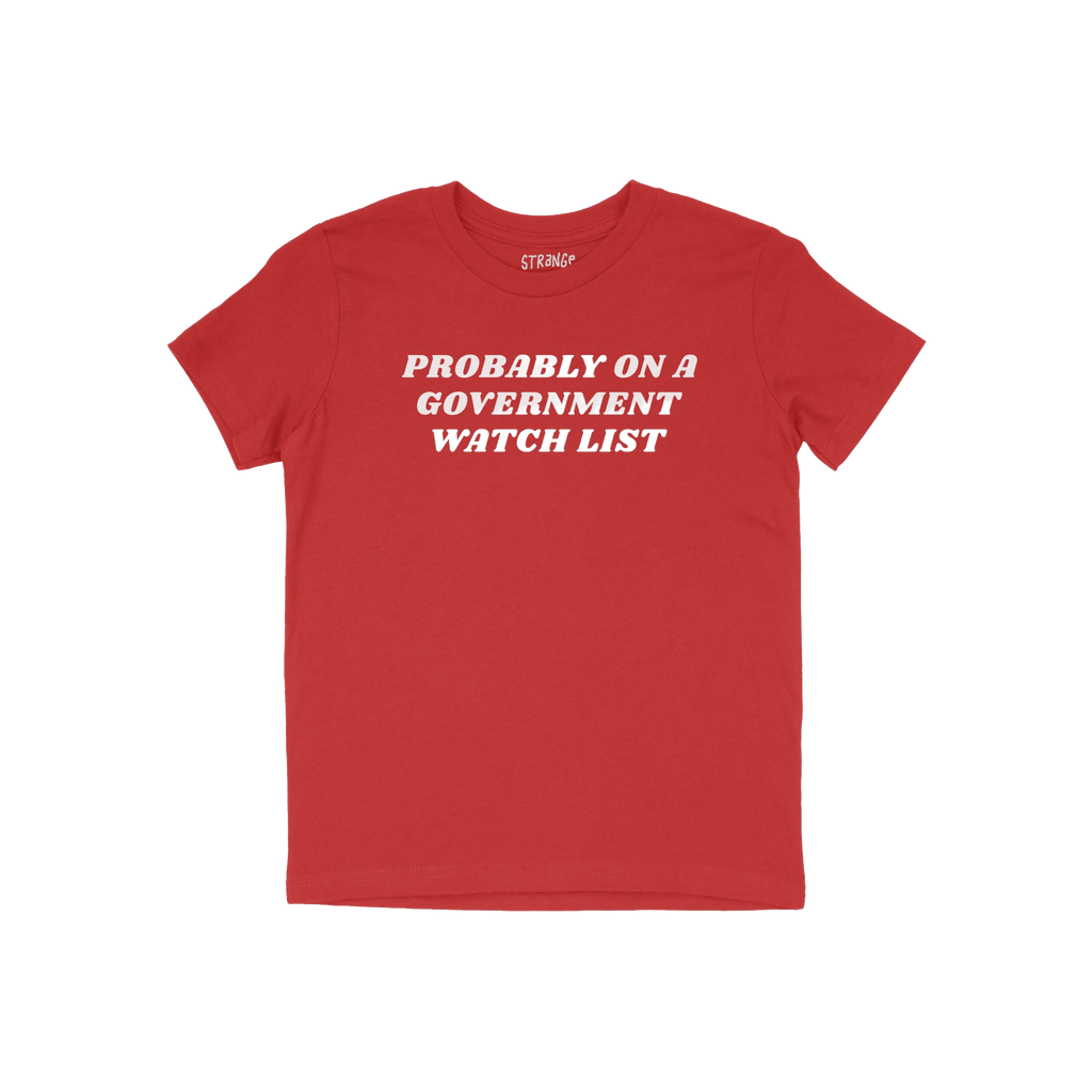 Watch List T-shirt features bold white text proclaiming “PROBABLY ON A GOVERNMENT WATCH LIST,” symbolizing defiance and v