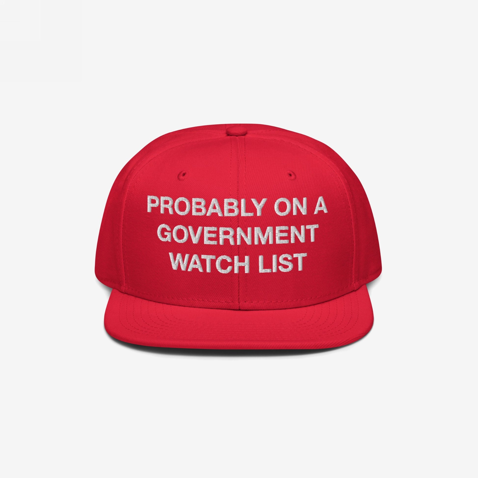 The Watch List Hat features bold white embroidery on a red, flat-brimmed cap, making a defiant statement for those unafraid to challenge authority and advocate for justice and equality.
