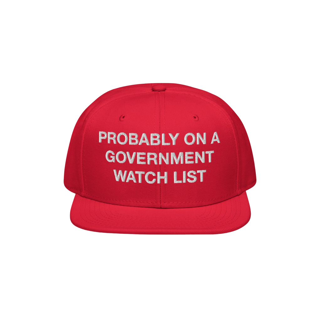 The Watch List Hat features bold white embroidery on a red, flat-brimmed cap, making a defiant statement for those unafraid t