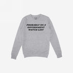 Watch List Hoodie & Sweatshirt features bold black text, “PROBABLY ON A GOVERNMENT WATCH LIST,” on a light-gray crewneck, embodying defiance and activism in a stylish, cozy fleece.