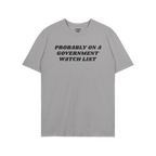 Watch List T-shirt featuring bold black text: “PROBABLY ON A GOVERNMENT WATCH LIST” on a heather-gray background, capturi