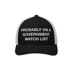 Mesh trucker cap with PROBABLY ON A GOVERNMENT WATCH LIST embroidered on the front, representing a bold statement of activism