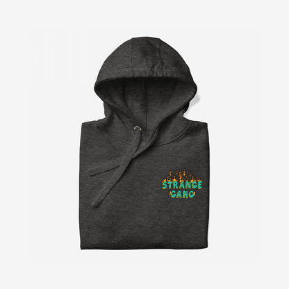 Charcoal-gray Your Favorite Band Has Always Been Political hoodie with a small flame chest logo, showcasing a bold statement graphic. Neatly folded with visible hood and drawstring.