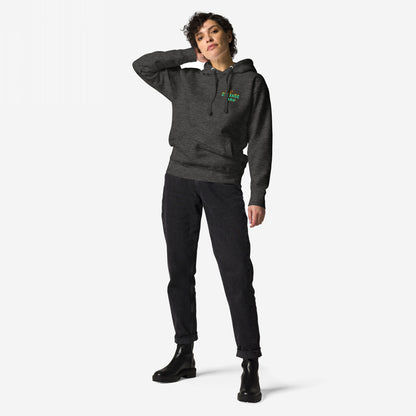 Model wearing the Your Favorite Band Has Always Been Political Hoodie, featuring a subtle chest logo, paired with high-waisted black jeans and chunky ankle boots, embodying a bold, rebellious aesthetic.