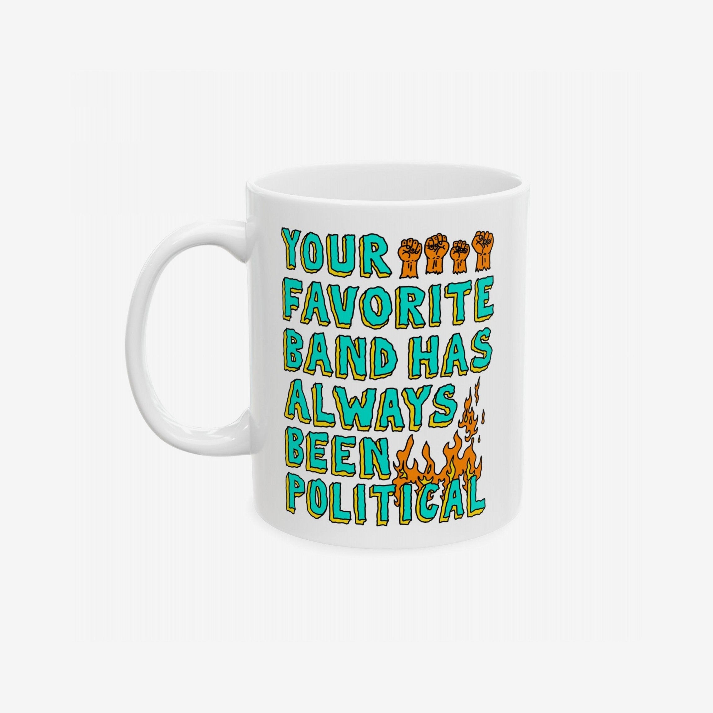 Your Favorite Band Has Always Been Political Mug features a bold slogan with raised-fist icons and flames, embodying a rebellious spirit perfect for fans of politically charged music.